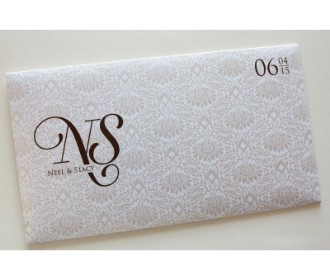 White and brown card with floral print